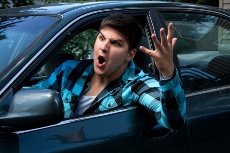 Man Yelling Out of Car Window